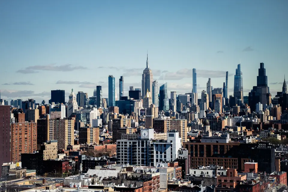 Wide view of the Manhattan skyline from a rooftop, Empire State Building at center